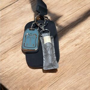 Floral Embossed Faux Leather laser cut chap stick key chain